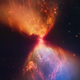 L1527 looks like an hourglass of orange and blue dust.